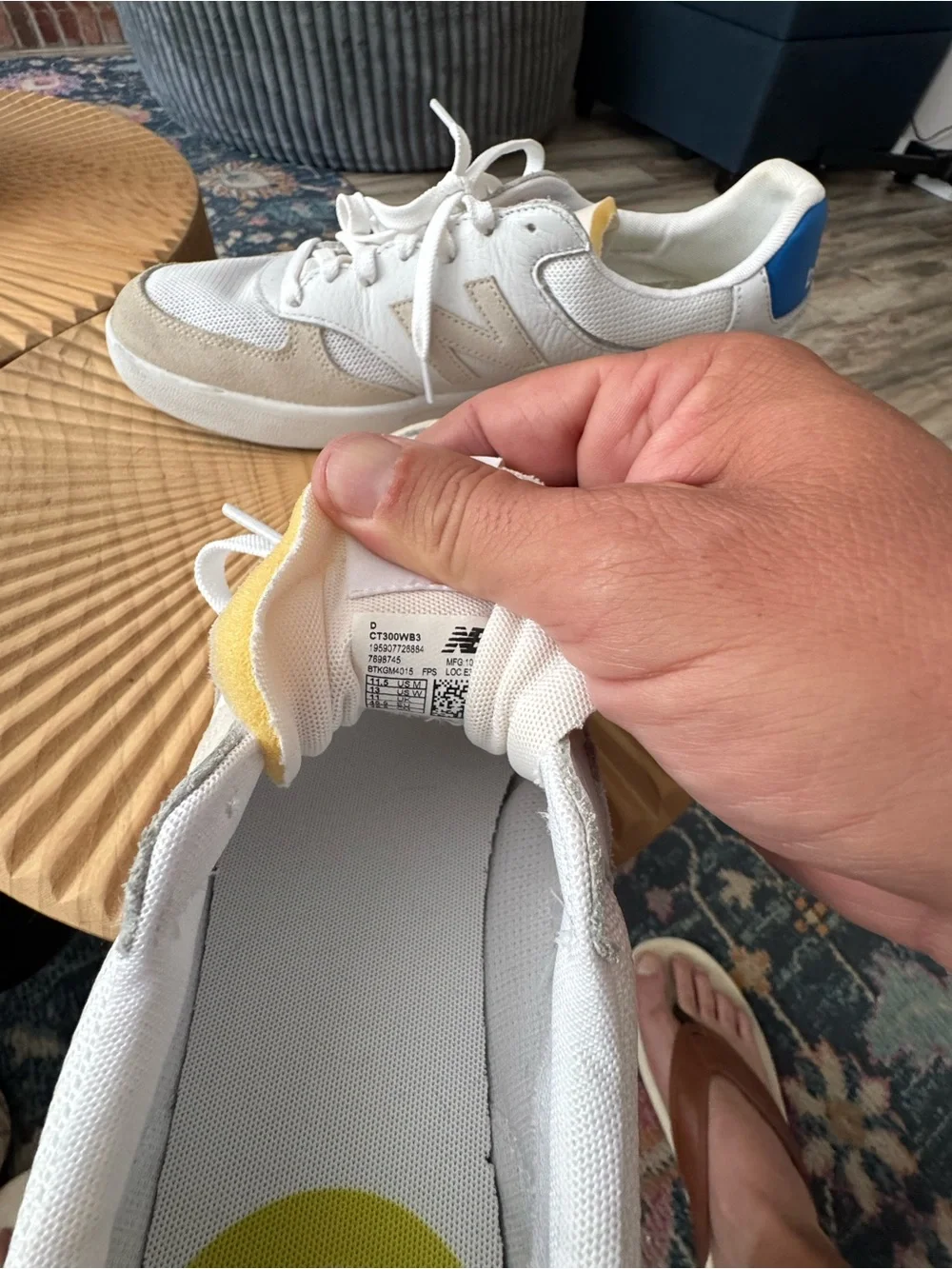 New Balance White Sneakers with Blue Heel Accent